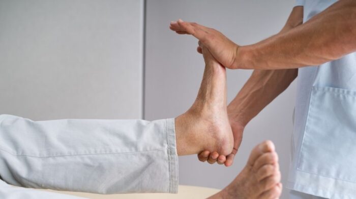 Physiotherapist treating an ankle sprain at NxtG Physio